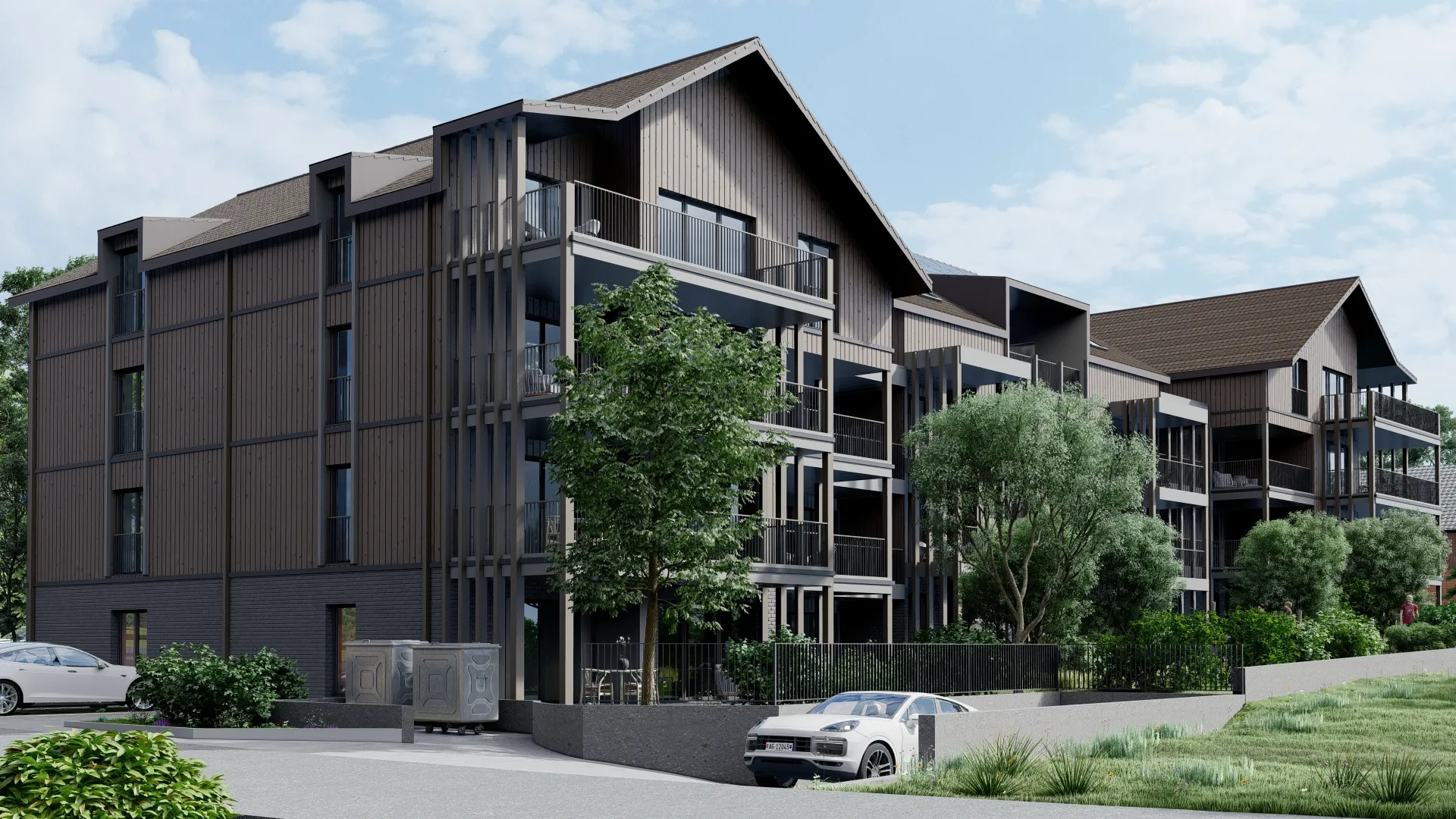 Haus A, B und C von Moosweih mit Holzfassade und Balkonen